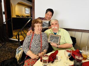 Carol, Larry and Takashi showing their Janet Akins award 